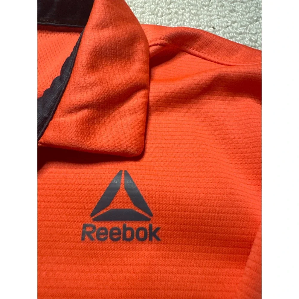 Reebok‎ Performance Polo Shirt Orange Mens L Short Sleeve Textured Golf Active